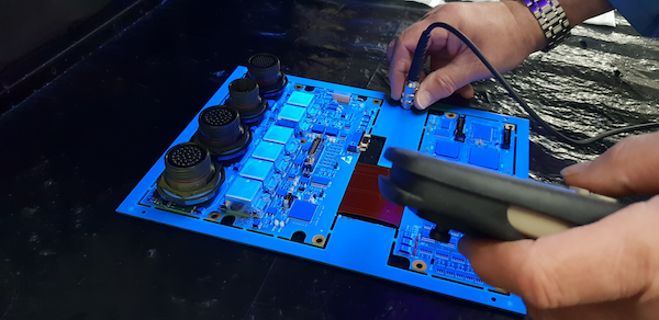 Positector 6000 measuring conformal coating thickness