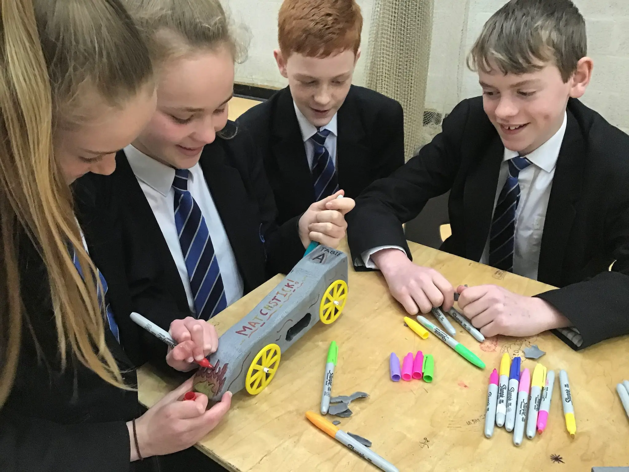 Students designing a car during the Race to the Line STEM engineering challenge